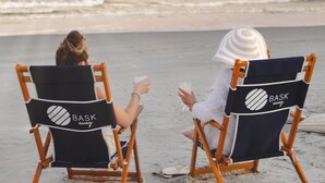 Two people sitting on beach chairs facing the ocean at sunset. - Rocks On The Side: Private Pool, Steps to the Beach, Murrells Inlet (Murrells Inlet)