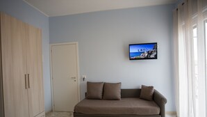 デラックス 4 人部屋 | デスク、防音設備、WiFi (無料)、ベッドシーツ