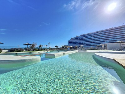 Frontline with Sea and Pool Views, Parking