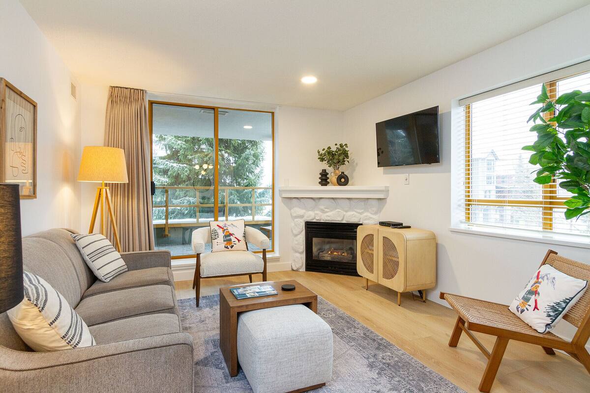 Apartamento premium | Área de estar | Lareira