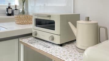 Fridge, microwave, stovetop, coffee/tea maker
