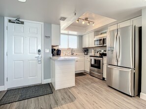 Fridge, microwave, oven, stovetop - Oceanfront Family Beach Escape - Pool, Beach, & Amazing Views (New Smyrna Beach)