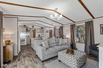 Relax on the water at this lakefront cabin with private dock access, fishing pier, and kayaks included.