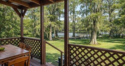 Lakefront cabin with sweeping views of Caddo Lake, lakeside to the pier and kayaks, plus a foosball table for fun downtime.