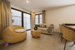 Suite – president | Oppholdsområde | En 50-tommers smart-TV med digitale kanaler