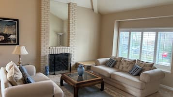 Smart TV, fireplace, DVD player, books