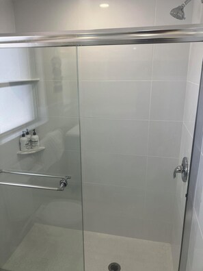 Hair dryer, towels, soap, shampoo