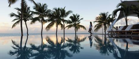 Outdoor pool, pool umbrellas, sun loungers