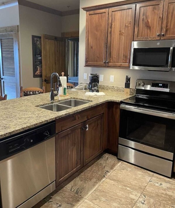 Fridge, microwave, oven, stovetop