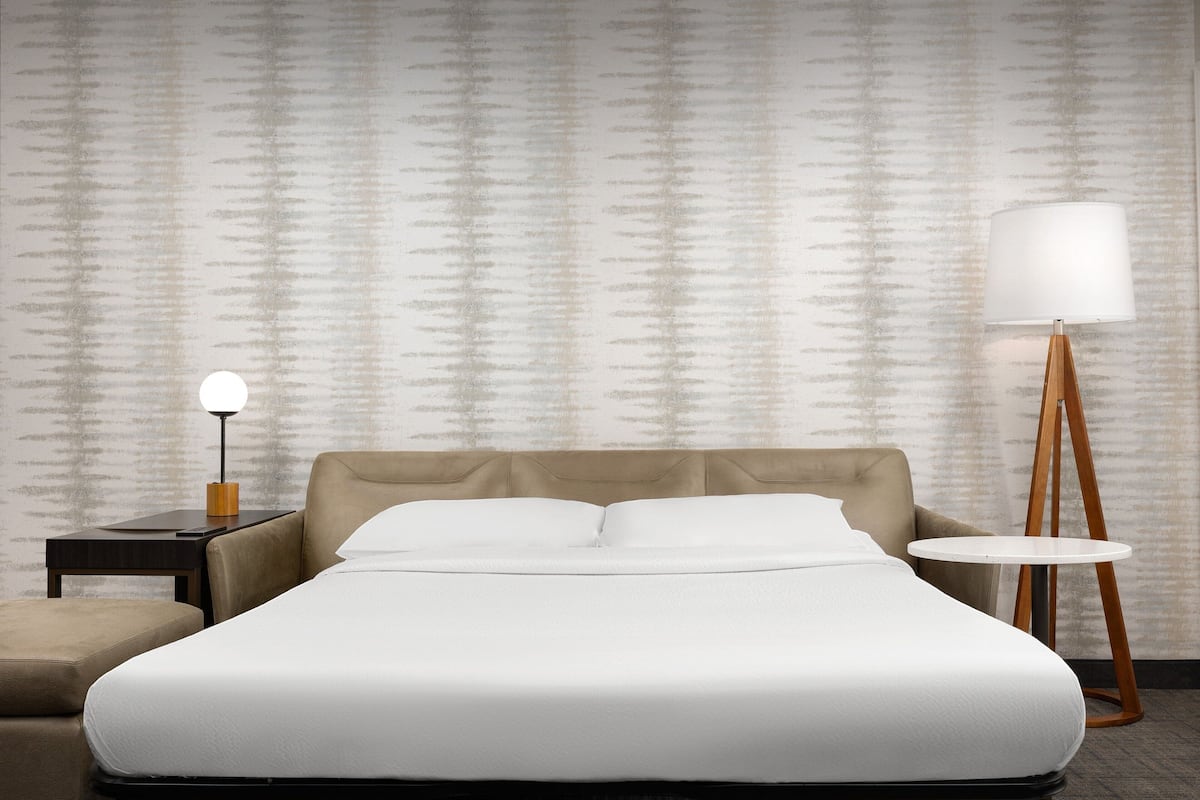 Premium bedding, desk, blackout curtains, iron/ironing board