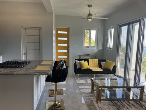 Experience Tranquility with Breathtaking Hillside Views overlooking Nanny Cay