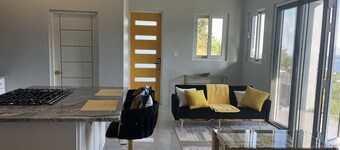 Experience Tranquility with Breathtaking Hillside Views overlooking Nanny Cay