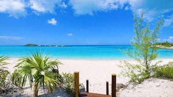 On the beach, sun loungers, beach towels