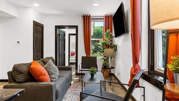 Smart TV, fireplace, books, offices