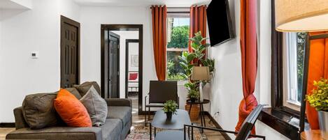 Smart TV, fireplace, books, offices