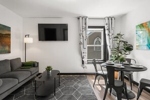 Smart TV, fireplace, books, offices