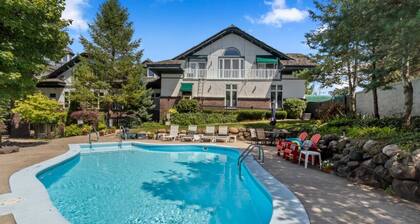 LG 1+1 Condo on Lakeshore - pool - walk to Lake