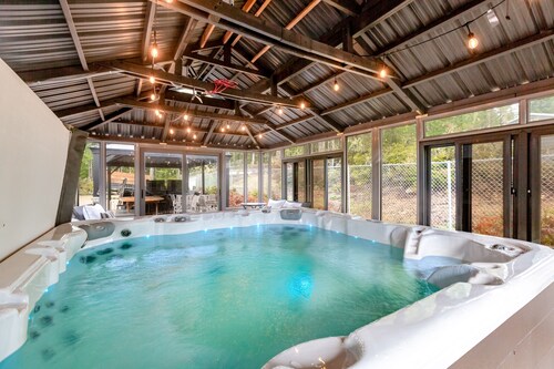 Amazing family retreat w/ game room, firepit, private hot tub, & tranquil views