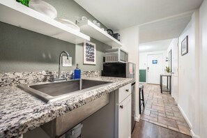 Fridge, microwave, dishwasher, coffee/tea maker