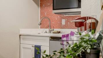 Fridge, microwave, coffee/tea maker, high chair