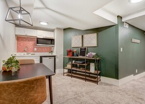 Fridge, microwave, coffee/tea maker, highchair