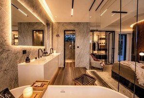 Regadera, amenidades de baño ecológicas, secadora de cabello, toallas 