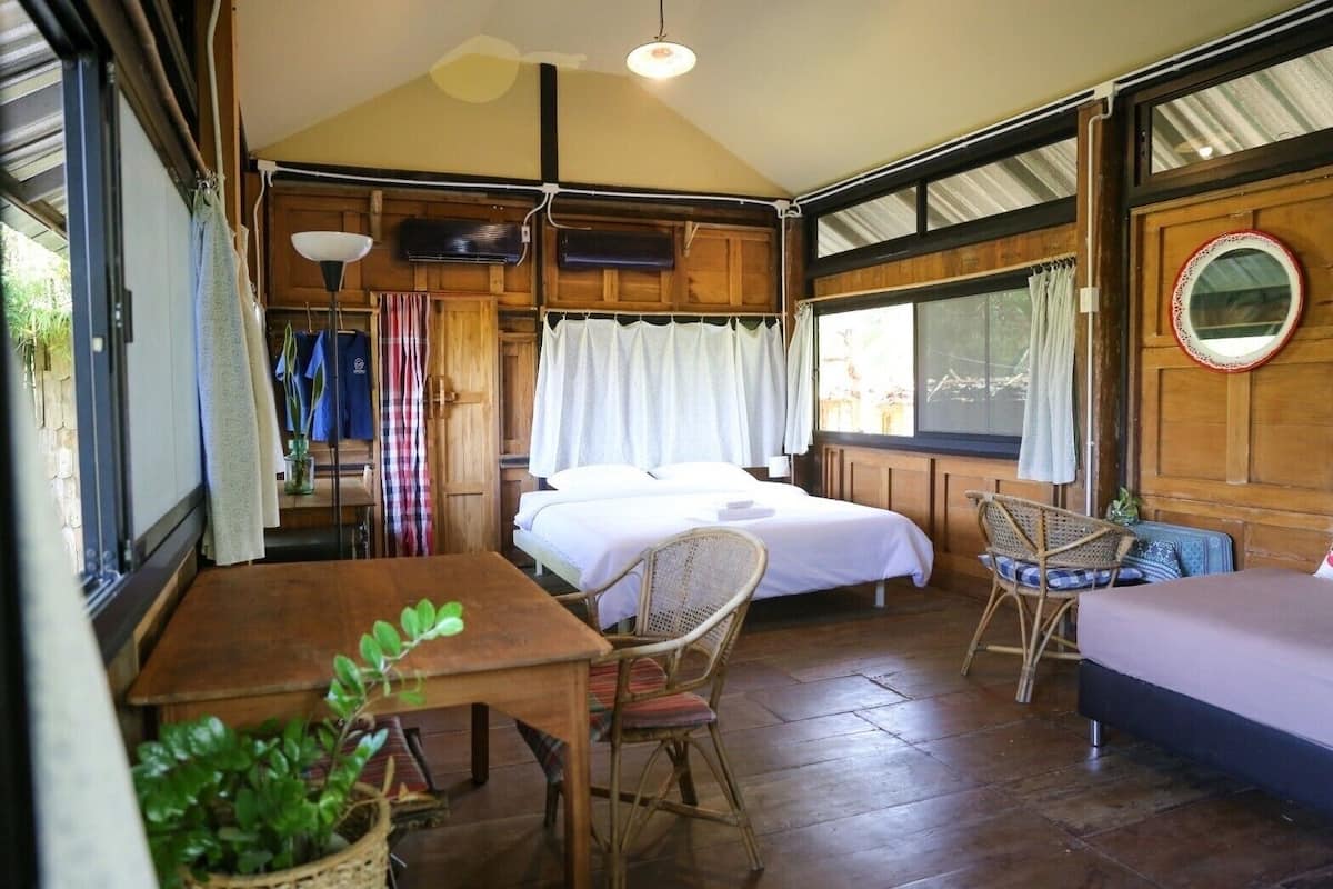 Signature huisje, 1 slaapkamer, terras, uitzicht op tuin | Hypoallergeen beddengoed, een gratis minibar, een bureau