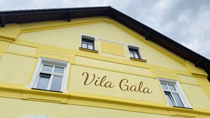 A building with the sign "Vila Gala" on its facade.