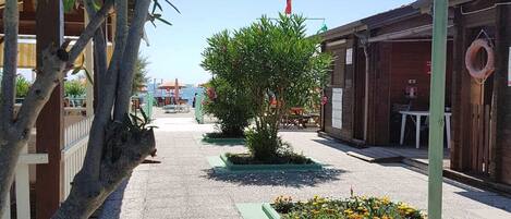 Private beach, sun-loungers, beach umbrellas, beach bar