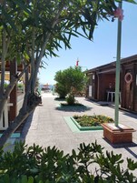 Private beach, sun loungers, beach umbrellas, beach bar