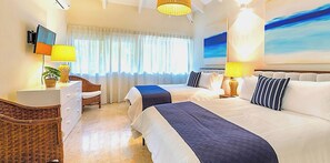 A hotel room with two beds, a desk, a chair, a television, and a window with curtains. - Srvittinivillas / Family/ Best Loc/ Casa de Campo Resort / Spacious/confort/golf (La Romana)