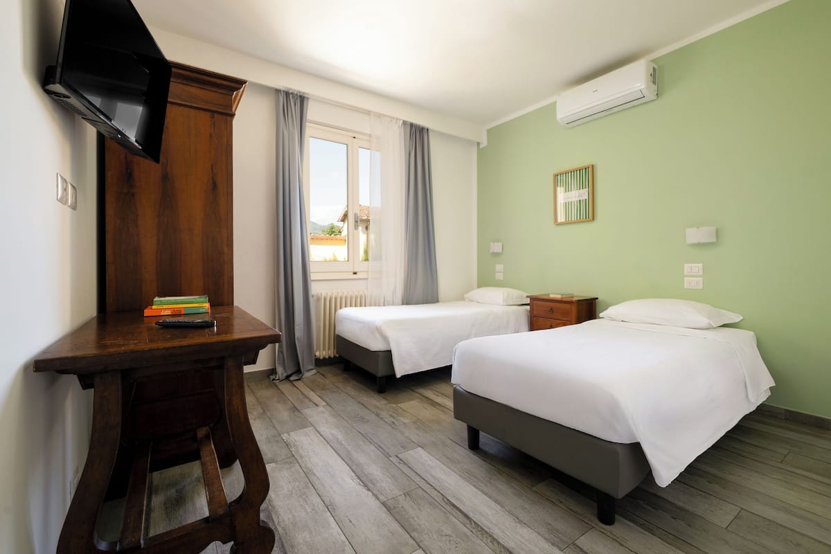 Desk, iron/ironing board (on request), WiFi (free), bed sheets
