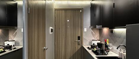 Fridge, microwave, stovetop, coffee/tea maker