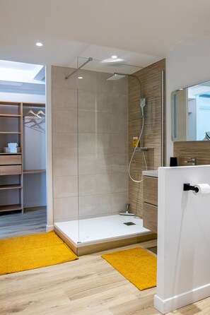 Shower, hair dryer, towels, soap