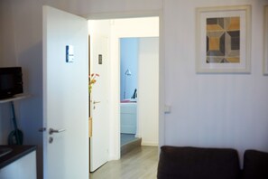 Departamento de lujo, 2 habitaciones | Área de sala de estar