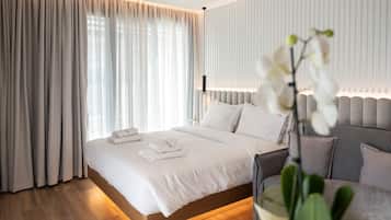 Deluxe Double Room | In-room safe, desk, laptop workspace, blackout drapes