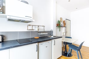 Fridge, microwave, coffee/tea maker, toaster