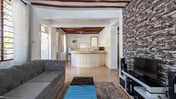 Family Villa | Living area | 24-inch Smart TV with digital channels