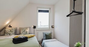4 bedrooms, iron/ironing board, travel crib, WiFi