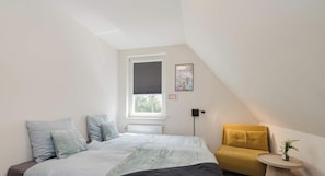 4 bedrooms, iron/ironing board, travel cot, WiFi