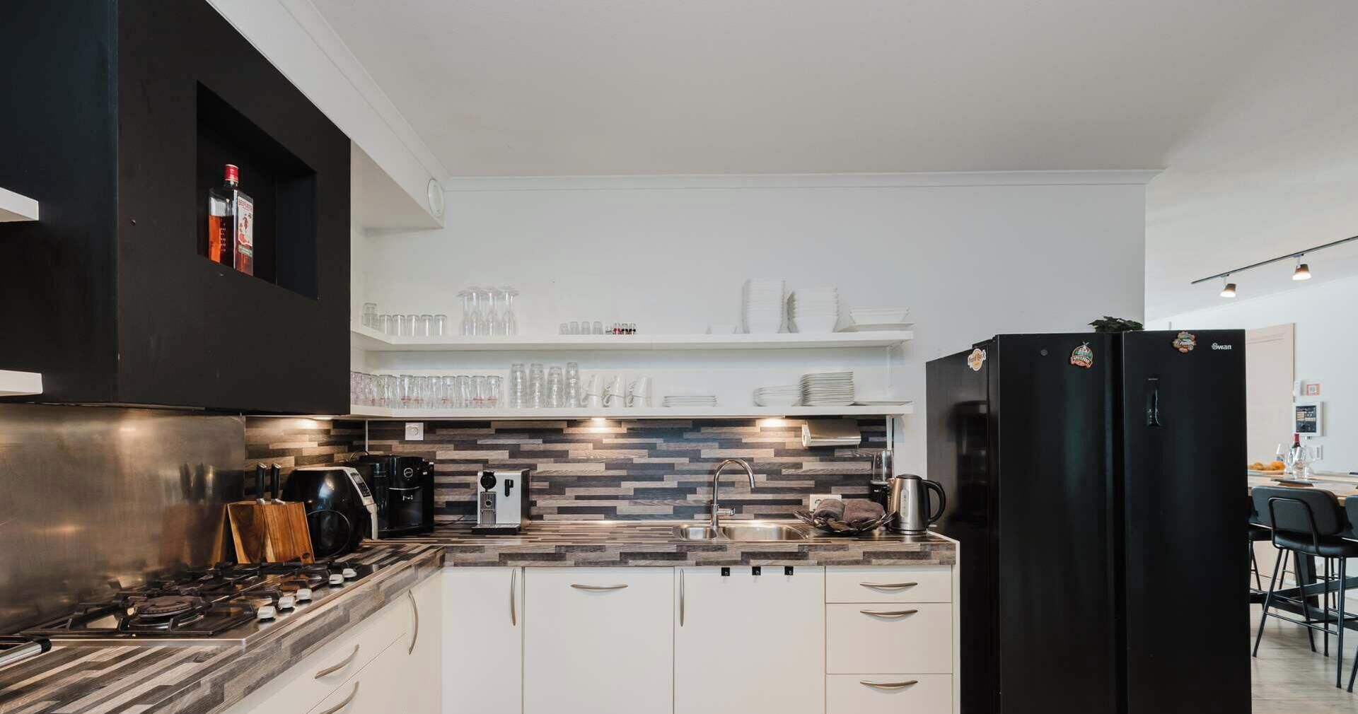 Coffee/tea maker, fridge, microwave, oven