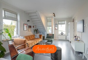 Smart TV, fireplace, DVD player, books