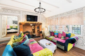 1 bedroom, desk, iron/ironing board, travel crib