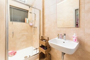 Hair dryer, towels, soap, shampoo