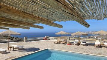 Seasonal outdoor pool, pool umbrellas, sun loungers