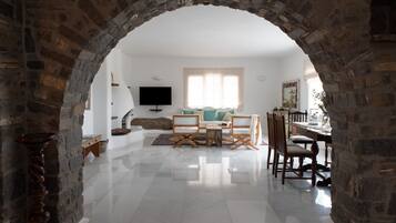 Villa Myrtia | Living area | 36-inch flat-screen TV with satellite channels, fireplace