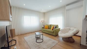 Appartement Deluxe, vue mer | Coin séjour