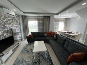 Deluxe Duplex, 3 Bedrooms | Living area | Flat-screen TV - Gardenya Lara Suit Hotel (Antalya)