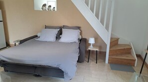 1 bedroom, desk, iron/ironing board, travel crib