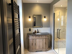 Shower, hair dryer, towels, soap